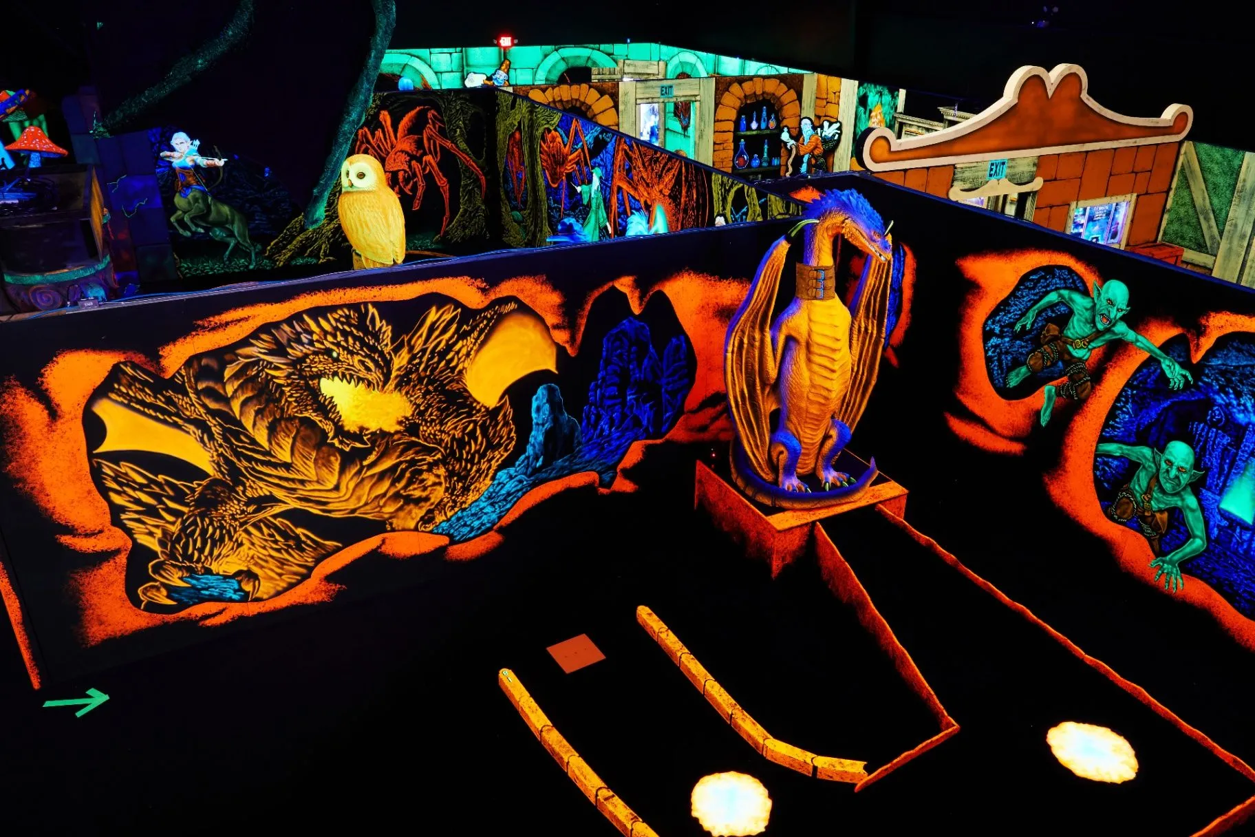 The glowing dragon and obstacles on Cooper’s Kingdom’s mini golf course